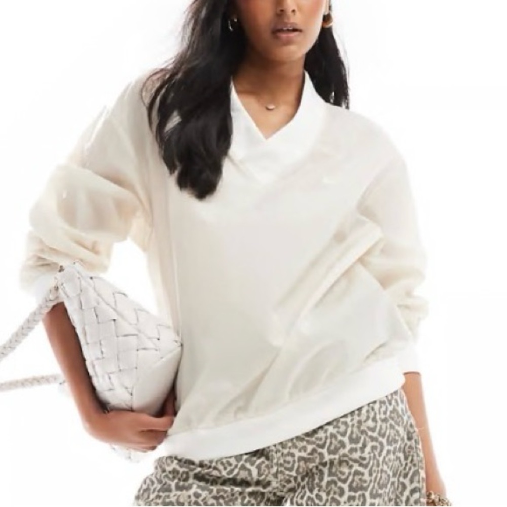 Nike Windrunner woven long sleeve crew neck top in orewood 
color nude